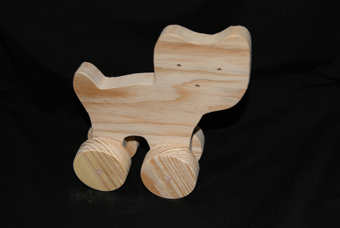 Handcrafted wooden animal Cat toy on wheels