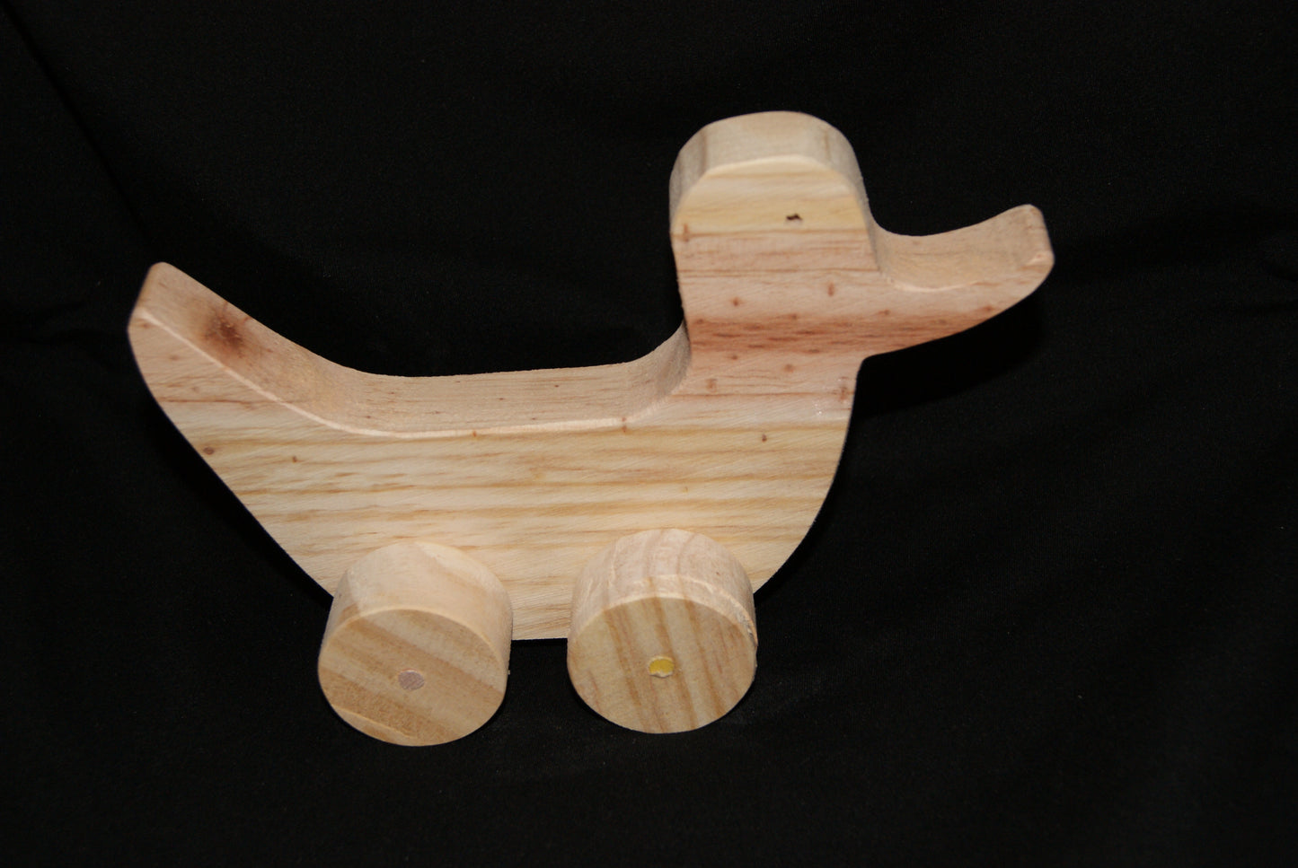 Handcrafted wooden animal Duck toy on wheels