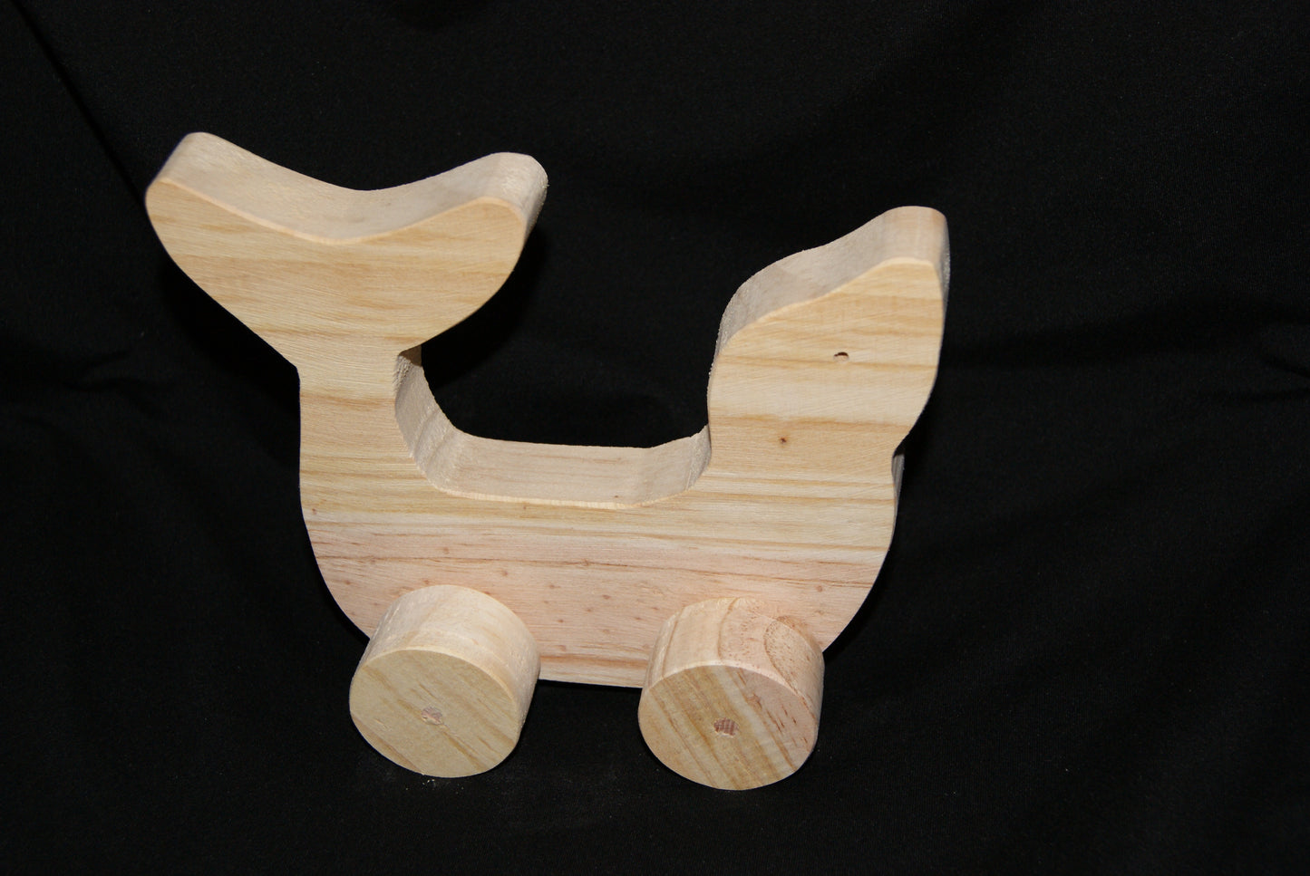 Handcrafted wooden animal Seal toy on wheels