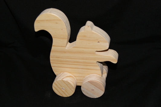 Handcrafted wooden animal Squirrel toy on wheels